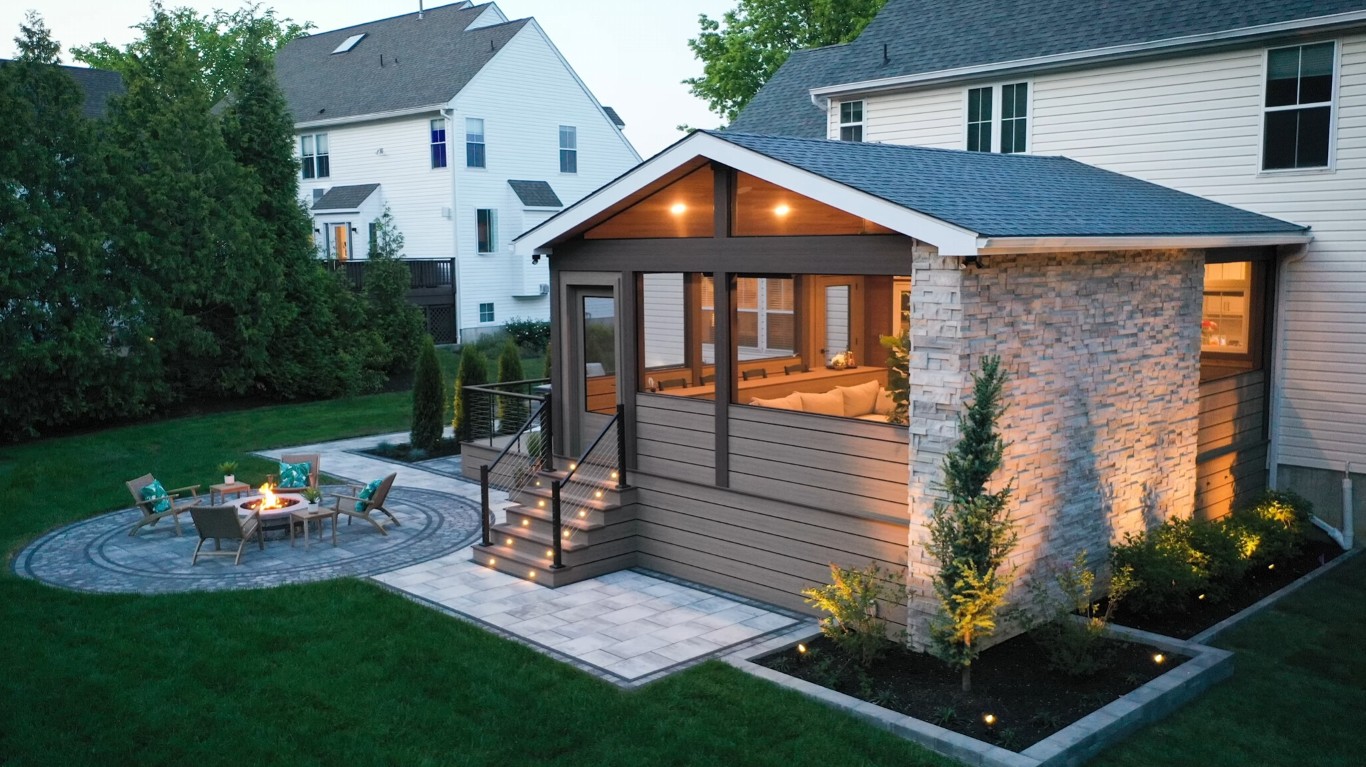 Beautiful modern sunroom with stone accent wall at evening in San Mateo, CA
